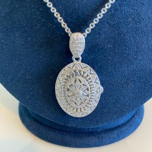 Diamond vintage style oval locket in sterling silver.